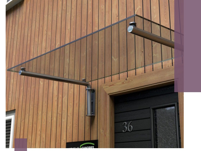 Стеклянные козырьки на входы и фасады в Ломоносове